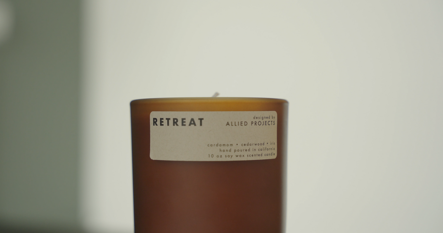 Retreat luxury candle by Allied Goods, designed for a rejuvenating, fresh home fragrance. Eco-friendly Retreat candle with light fragrance, ideal for relaxation and self-care. Luxury candle with clean-burning wax and natural fragrance by Allied Goods. Eco-friendly candle with sustainable ingredients for a refreshing home scent.