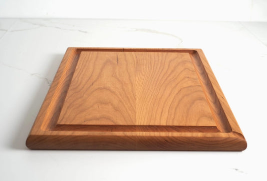 Handcrafted cherry wood and walnut cutting boards by Allied Goods, perfect for kitchen prep or serving. Premium cherry wood and walnut cutting boards, designed for durability and elegant kitchen use. Allied Goods cherry and walnut cutting boards, featuring a beautiful wood grain and sturdy surface. Sustainable cherry wood and walnut cutting boards, ideal for chopping, slicing, and serving in style.