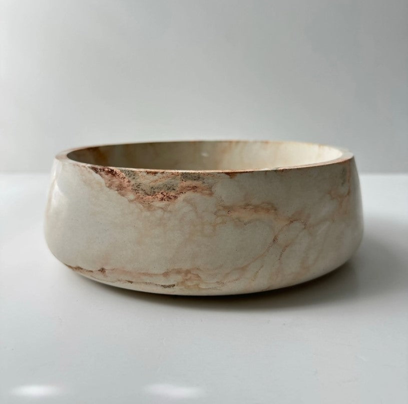 Elegant concrete bowl with peach veining by Allied Goods, perfect for modern home decor. Handcrafted concrete bowl with unique peach veining, ideal for stylish storage or display. Allied Goods concrete bowl, featuring subtle peach veining for a touch of sophistication. Contemporary concrete bowl with beautiful peach veining, perfect for adding texture to any space.