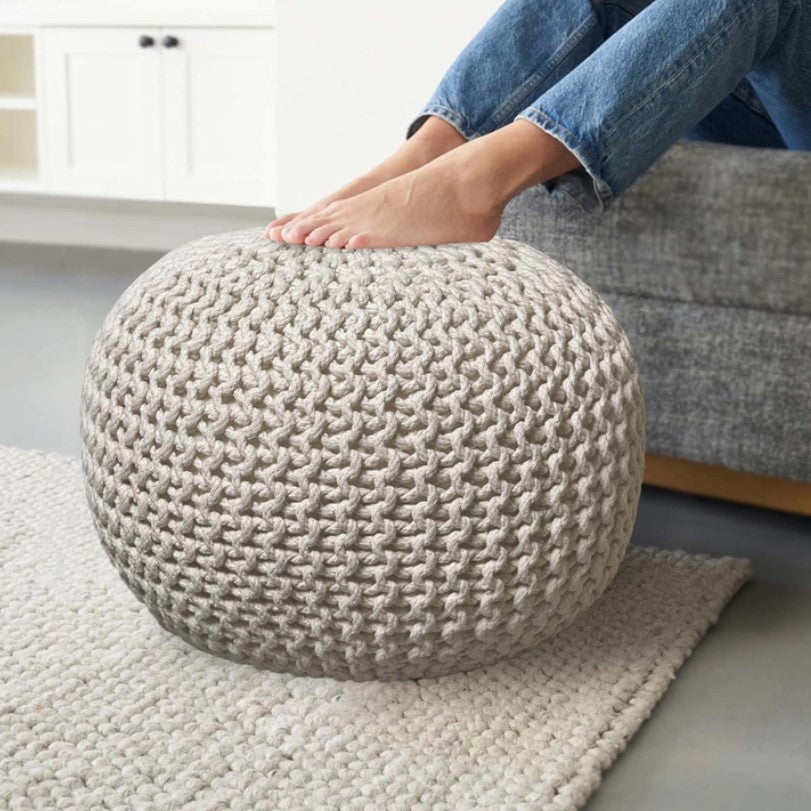 Handcrafted crochet ottoman in ivory cotton, perfect for boho or minimalist decor. Soft, ivory cotton crochet ottoman, ideal as a footrest or stylish accent piece. Allied Goods ivory crochet ottoman, versatile and cozy for modern home interiors.