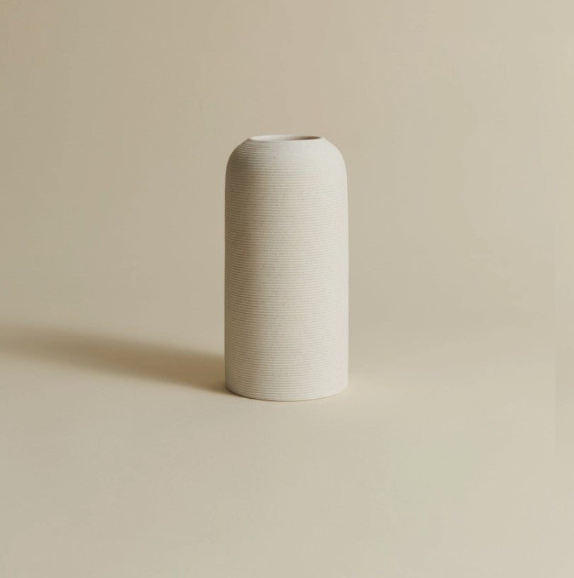 Handmade clay vase by Allied Goods, featuring a minimalist design for modern home decor. Elegant clay vase, perfect for displaying flowers or as a sculptural piece in any room. Allied Goods handmade clay vase, with a timeless design that complements contemporary interiors. Simple and stylish clay vase, ideal for adding texture and elegance to your home decor.